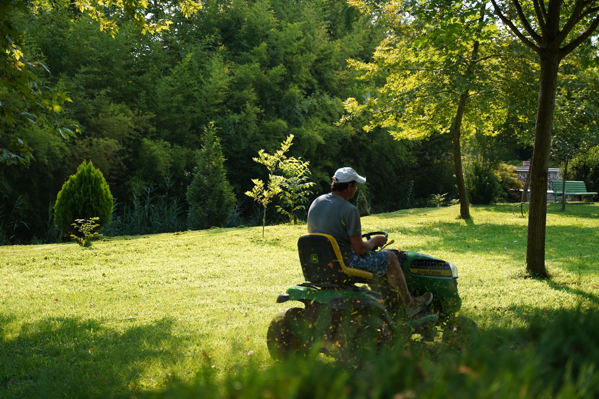 a man mowing a lawn